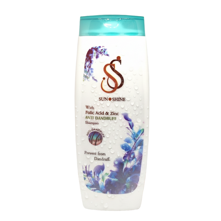 Shampoo bottle with blue cap and floral design on a wooden surface